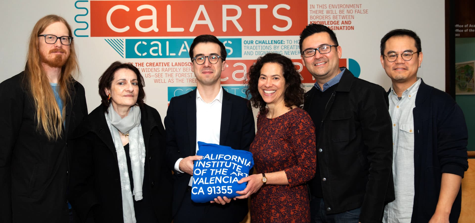 Members of the search committee celebrate with João Ribas (center), the newly appointed executive director of REDCAT. Edgar Miramontes (second from right) was promoted to deputy executive director and curator. Also, left to right: Michael Ned Holte (faculty), Berenice Reynaud (faculty), Tracie Costantino (provost and search committee chair), and Chi-wang Yang (faculty). Not pictured: Tim Disney (chair of CalArts Board of Trustees and search committee member).