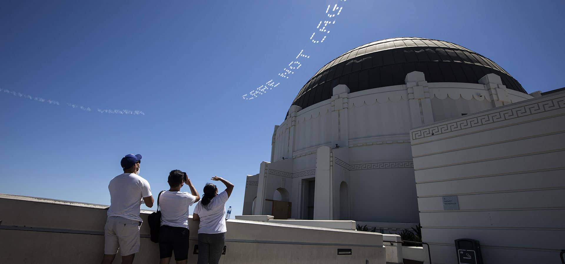 Patrisse Cullors' 'Care Not Cages #XMAP' was skytyped over the Los Angeles County Jail on Los Angeles on July 3. | Photo: Chris Mastro, courtesy of In Plain Sight.