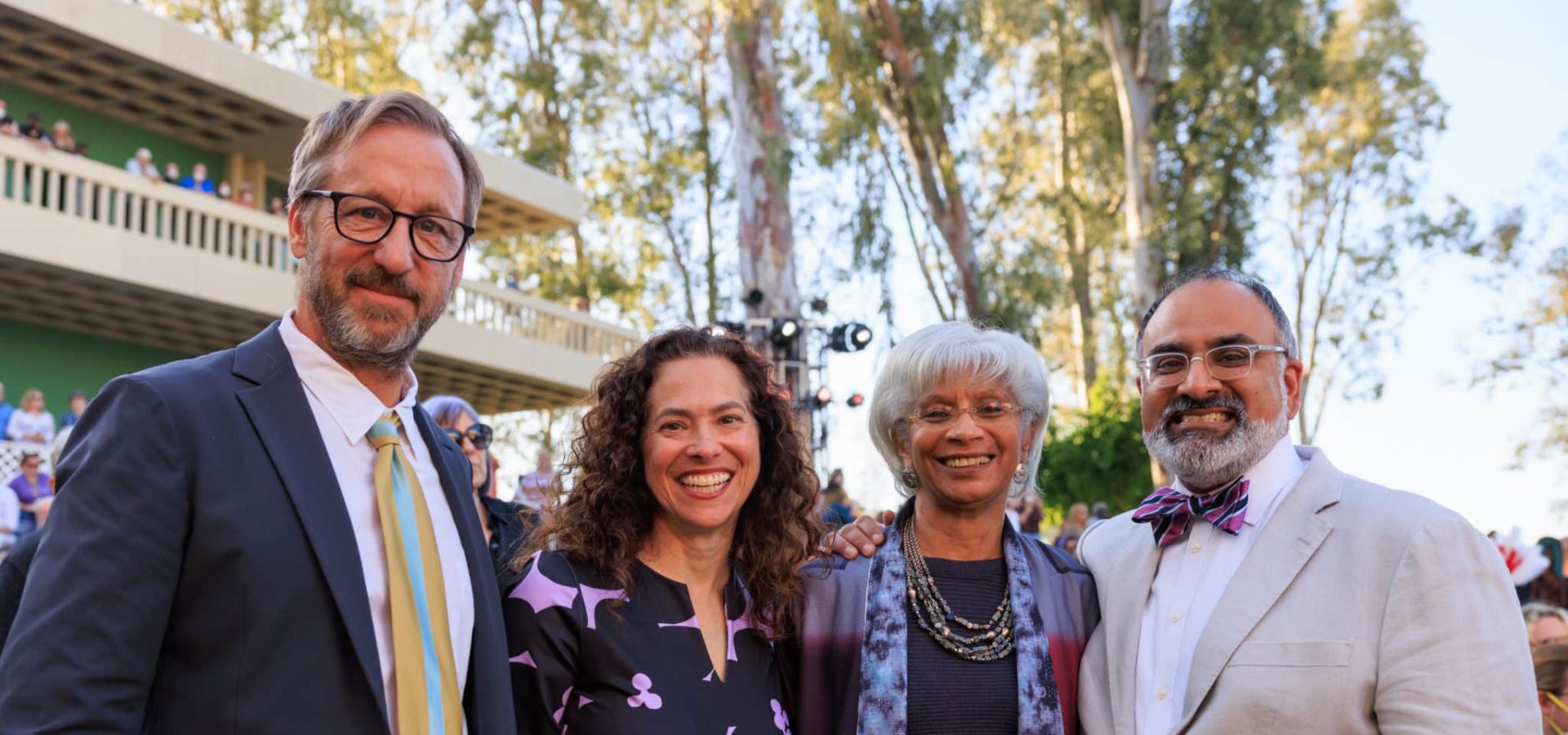 4 people standing for a picture at the CalArts Graduation 2022