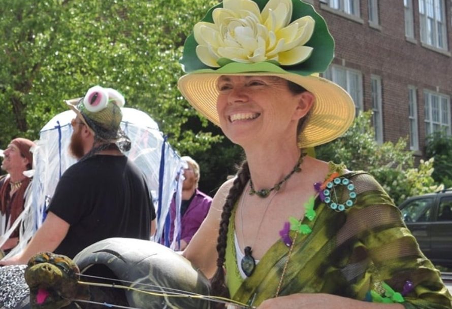 woman in a hat with flowers