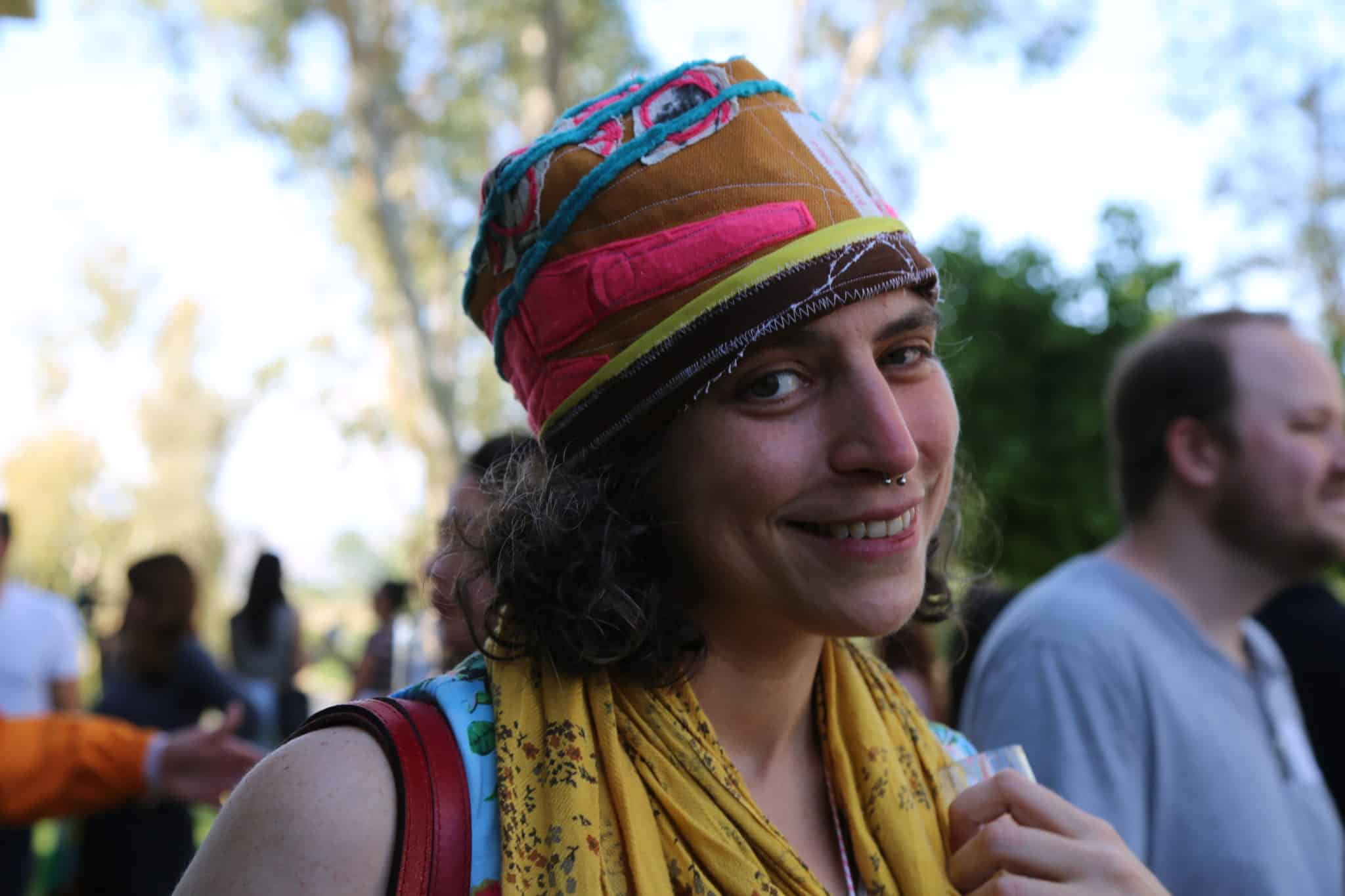 one person in hat smiling at camera