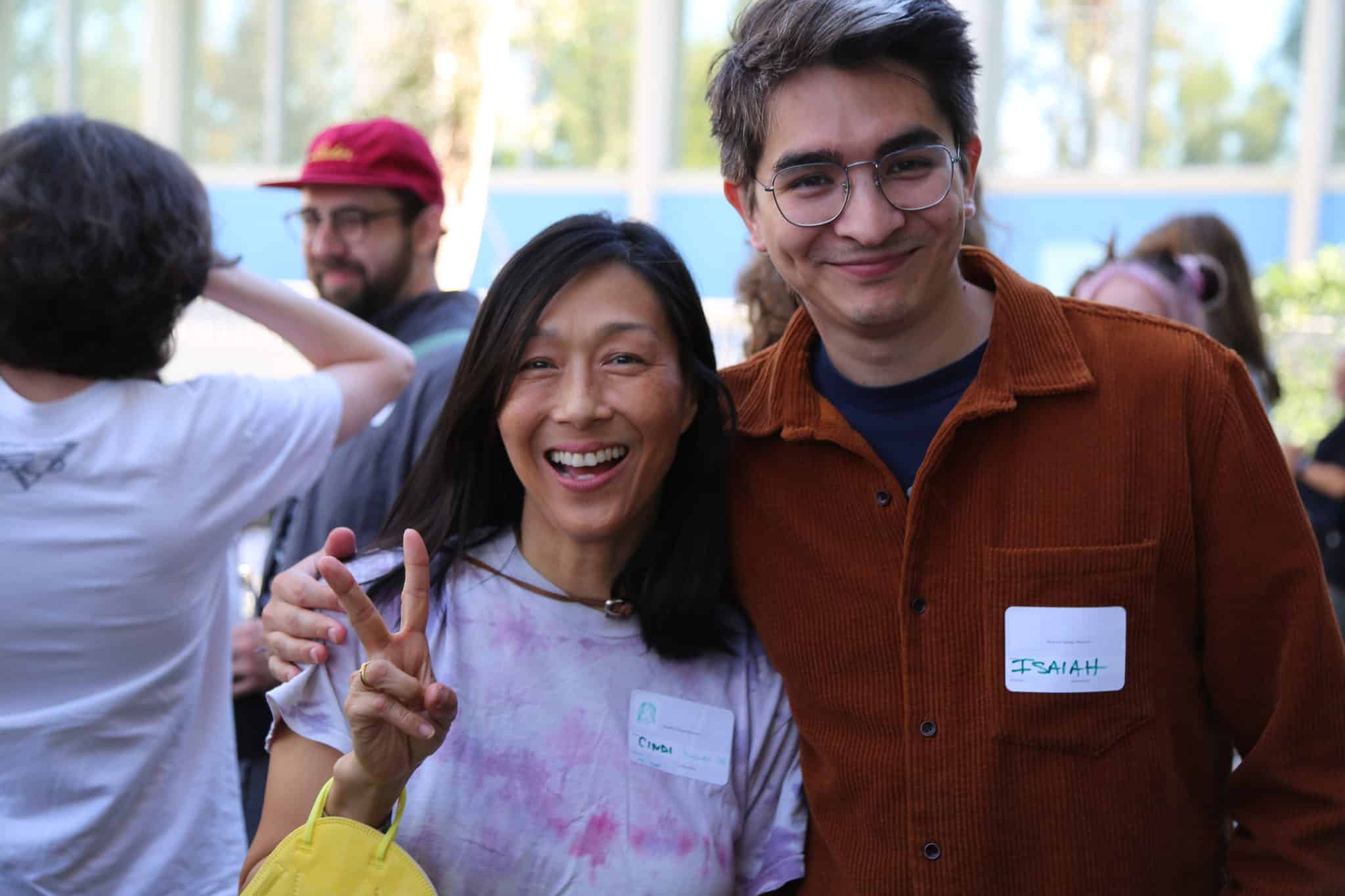 Two people smile for the camera.
