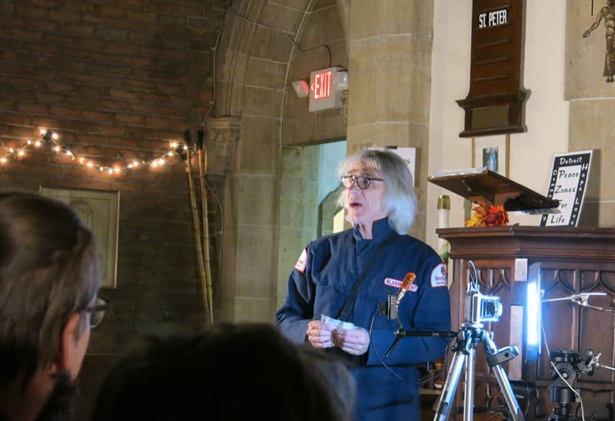 Gary Schwartz in costume uniform performs for crowd