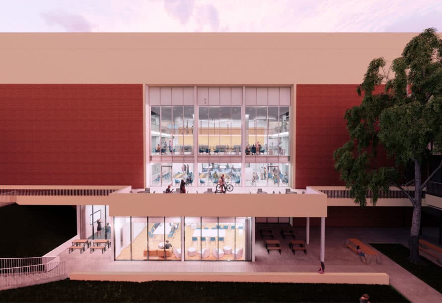 Rendering of studio block with large windows and modern stations and furnishings